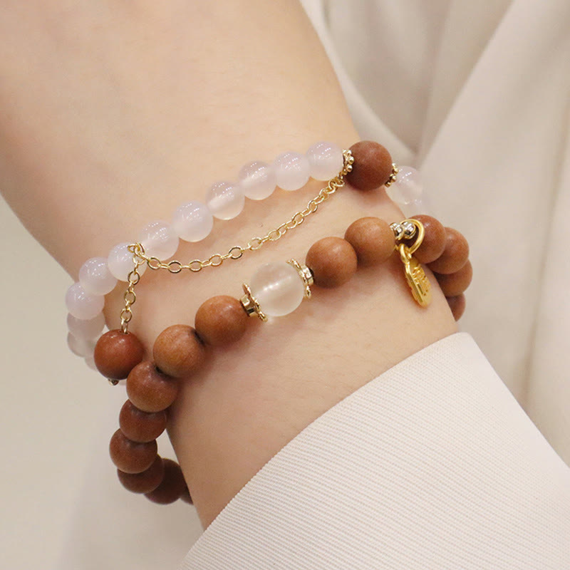 Buddha Stones Armband met bedeltje van sandelhout, kattenoog en Fu-figuur. - image 17