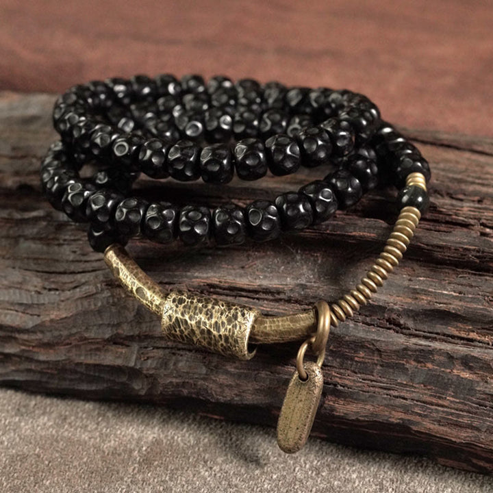 Buddha Stones Retro armband van kokosnootschaal, messing en koper met drievoudige wikkeling . - image 2