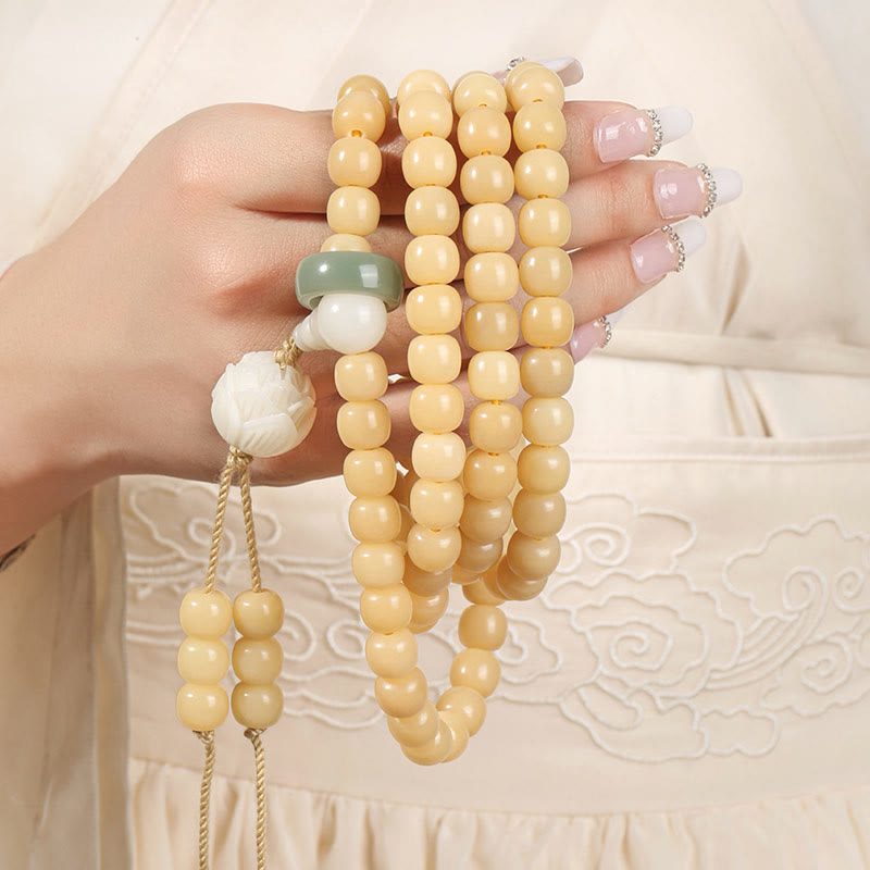 Buddha Stones Armband met vredes- en harmoniebedel van natuurlijke bodhizaadlotus (Dzi-kraal) - image 1