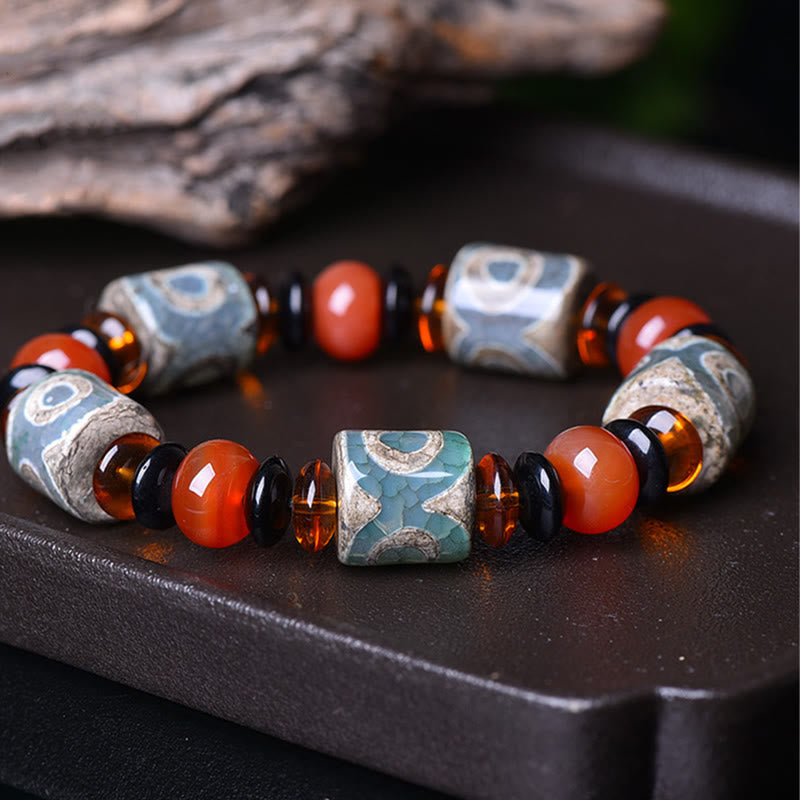 Buddha Stones Tibetaanse Armband met drieoogige Dzi-kralen van agaat voor bescherming en geluk. - Drieogige Dzi-kraal - image 0