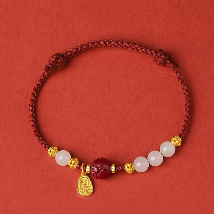 Buddha Stones 24-karaats vergulde Hetian witte jade cinnaber lotus Armband - image 1