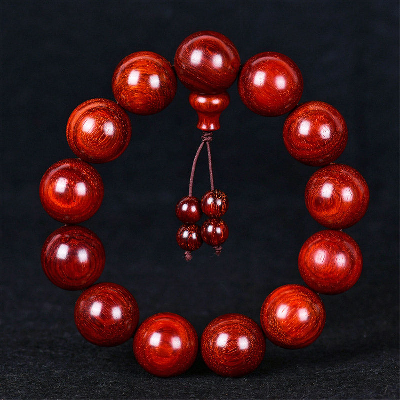 Buddha Stones Tibetaanse Armband met kleine rode sandelhouten blaadjes - image 0