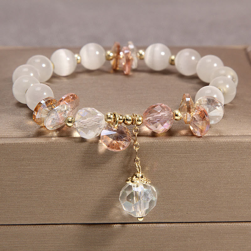 Buddha Stones Armband met vredesbedeltje in de vorm van een kattenoog, roze kristal - Kattenoog - image 0