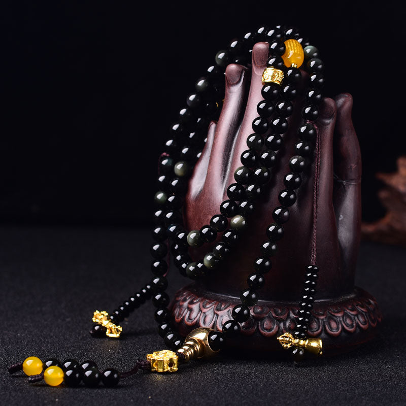 Buddha Stones Mala Armband met 108 kralen van natuurlijke zwarte obsidiaan en lotusmotief. - image 1