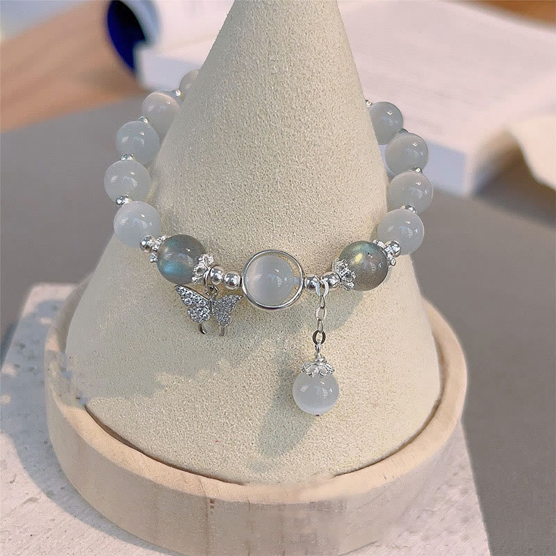 Buddha Stones Armband met bedeltjes van kattenoog, maansteen, vlinder en ster - image 1