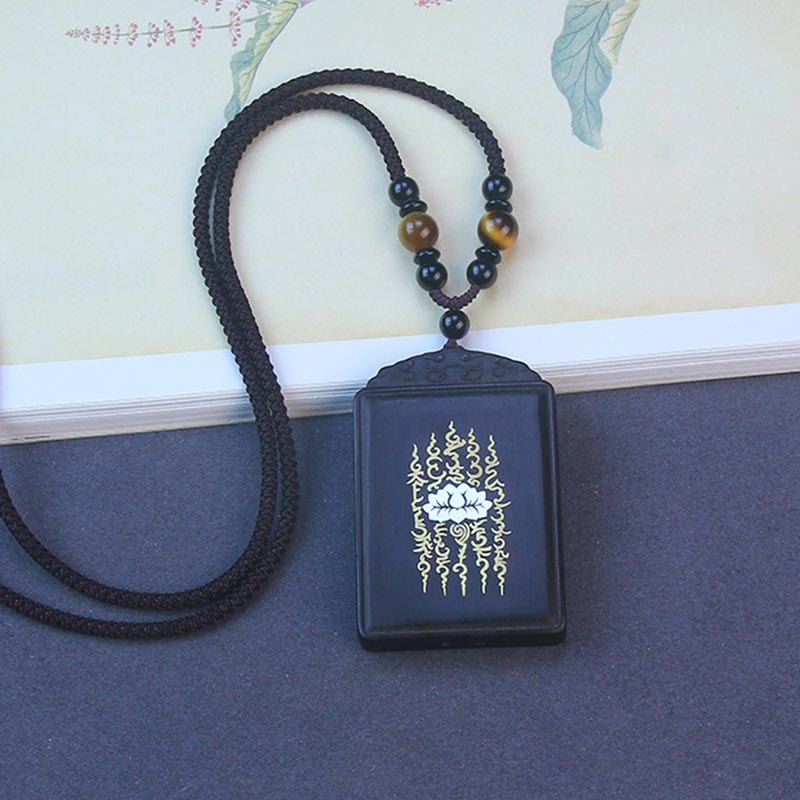 Buddha Stones Ketting van 999 sterling zilver met ingelegde lotusbloem van ebbenhout, in de stijl van een kalmerend symbool. - image 1