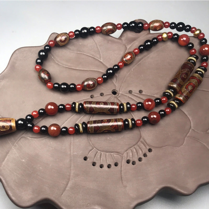 Buddha Stones Ketting met negenogen Dzi-kralen van rode agaat, symbool voor rijkdom en gezondheid. - image 1