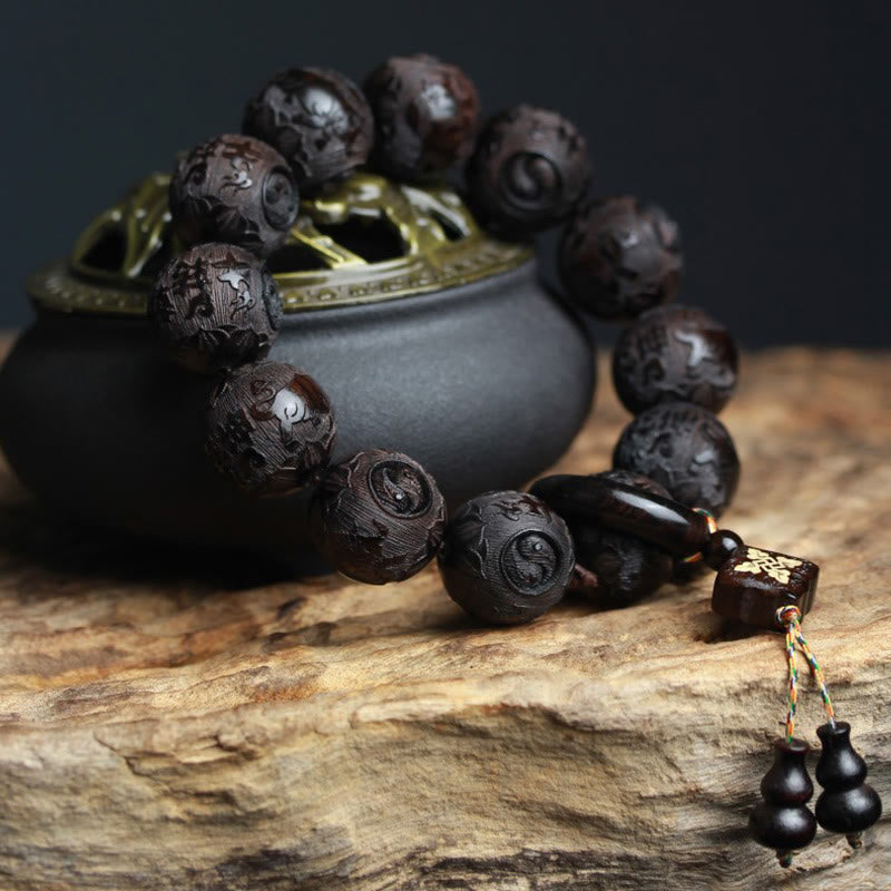 Buddha Stones Armband van ebbenhout met Chinese karakters Yin Yang gegraveerd - image 1