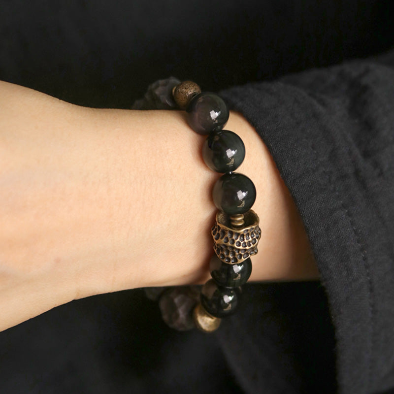 Buddha Stones Armband voor koppels, gemaakt van zwart obsidiaan, ebbenhout en koper. - image 3