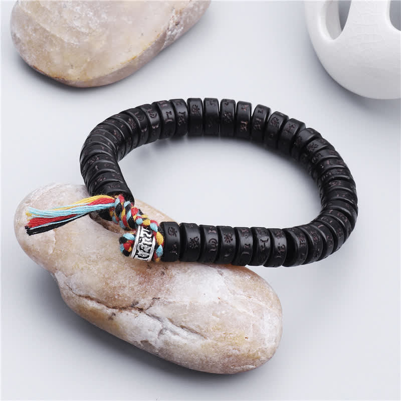 Buddha Stones Tibetaanse armband met kralen van kokosnootschelpen en gegraveerde Om Mani Padme Hum mantra ( Armband ). - image 1