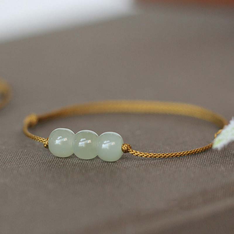 Buddha Stones Armband met drie jade kralen en gelukssymbool, geweven met een touwtje. - Bruin (Polsomtrek 14-20 cm) - image 3