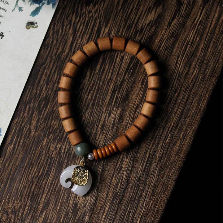 Buddha Stones Armband van sandelhout en jade met olifantje - image 11
