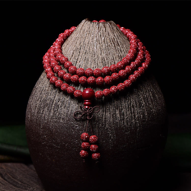 Buddha Stones 108 Mala kralen met cinnaber Om Mani Padme Hum patroon gegraveerde Armband - 6mm* 108 ronde kralen gegraveerd - image 0