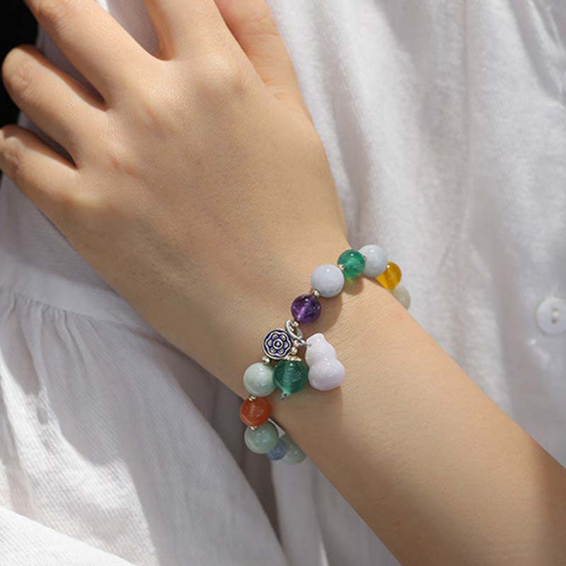 Armband van kalebas en jade - image 7