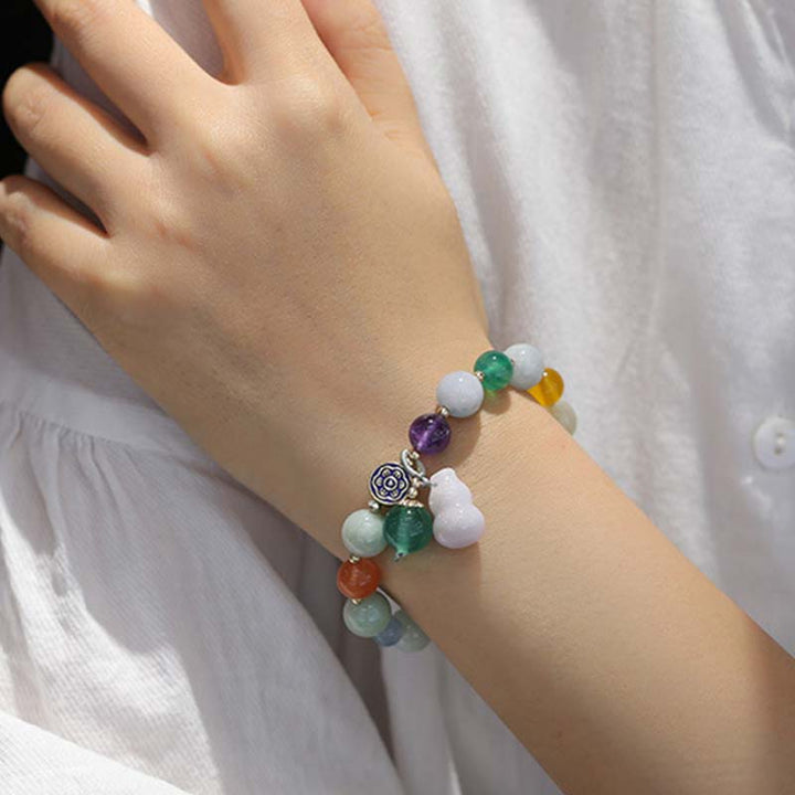 Armband van kalebas en jade - image 7