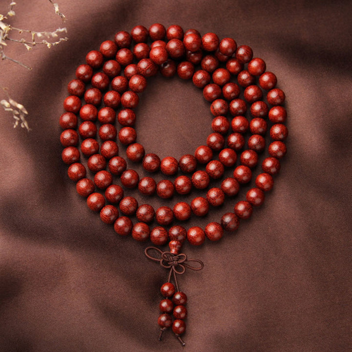 Buddha Stones Tibetaanse Mala - Armband met 108 kralen van rood sandelhout met kleine blaadjes. - image 3