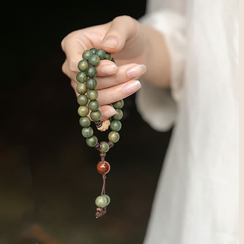 Buddha Stones Groene sandelhouten Armband met positieve boodschap en vredesmotief - image 1