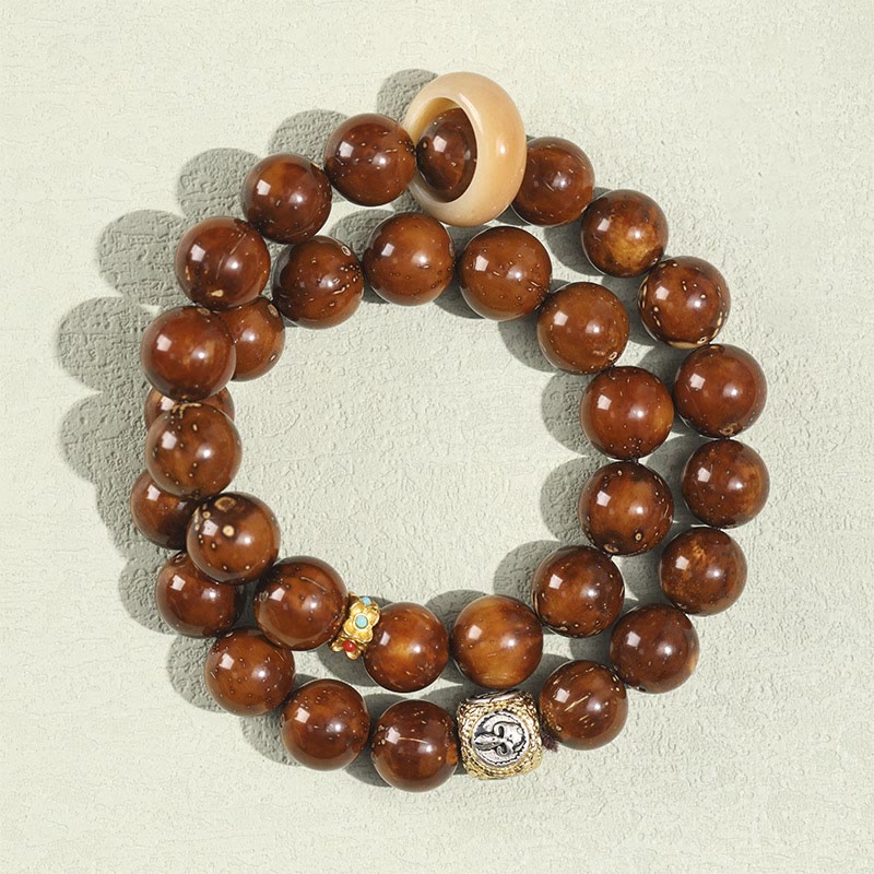 Buddha Stones Tibetaanse Armband met dubbele wikkeling, gemaakt van natuurlijk paars goud, met een rat en bodhizaad als symbool van rijkdom. - image 1