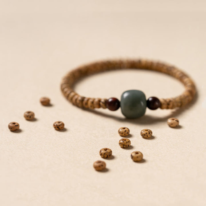 Buddha Stones Armband van Bodhizaad, kleine blaadjes en rood sandelhout. - image 6