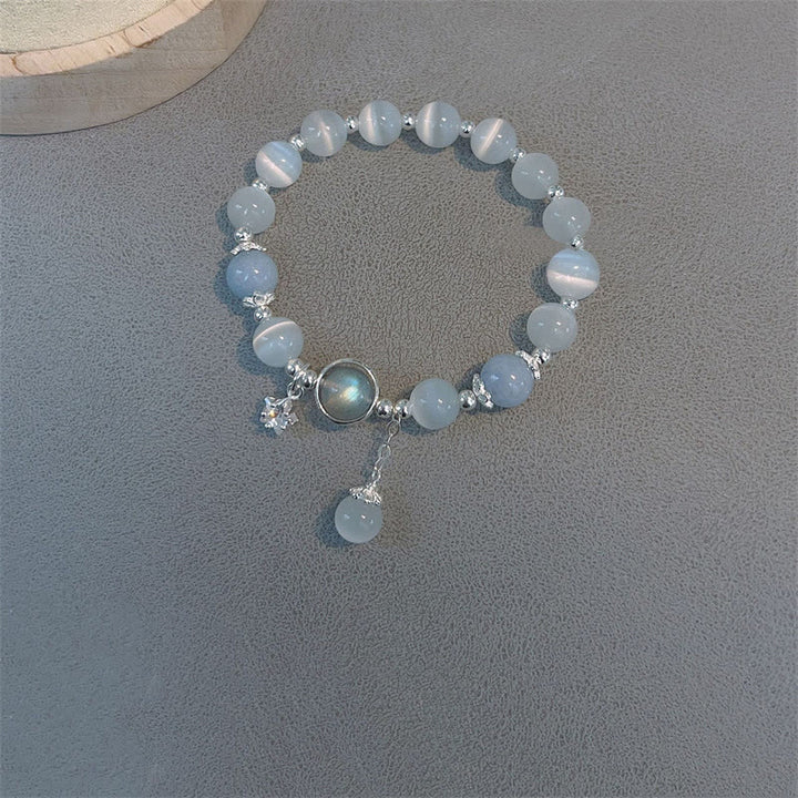 Buddha Stones Armband met bedeltjes van kattenoog, maansteen, vlinder en ster - image 13