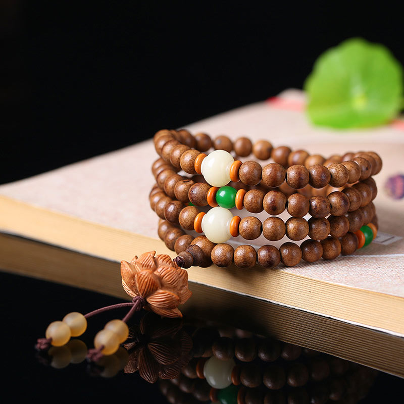 Buddha Stones 108 Mala kralen van perzikhout, Bodhizaad, Lotus, gebeds- en Armband - image 1